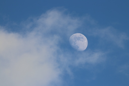 Moon in blue sky