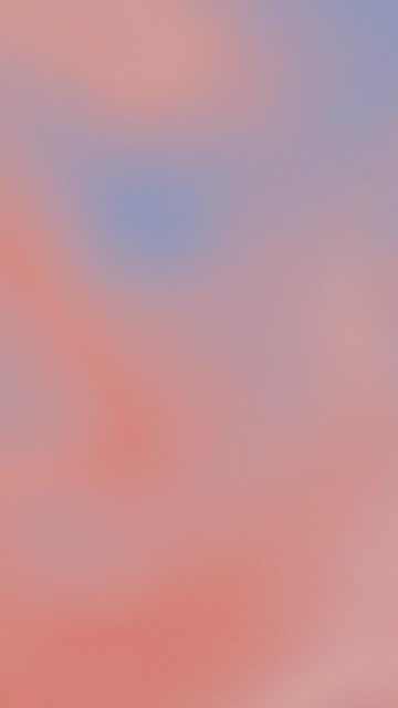 Vertical video with movement of orange and blue colors with gradient and blurred background.