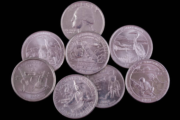 istock U.S. commemorative quarter dollars on black background 2133356802