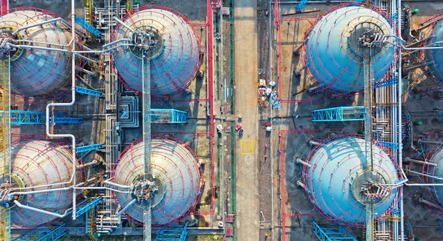 Aerial view of large oil tanks in industrial area