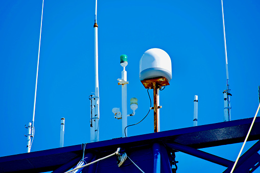 Close-up view of communications and navigation equipment aboard a commercial fishing trawler.