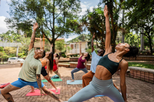 istock Teacher on yoga class outdoors 2133374695
