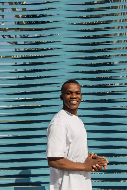 istock American guy enjoying a summer day outdoors 2133376823