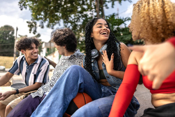 istock Young friends talking at city street 2133385372