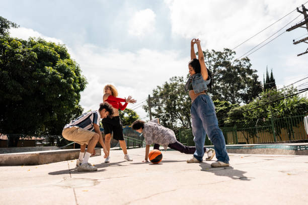istock Young friends stretching outdoors 2133392239