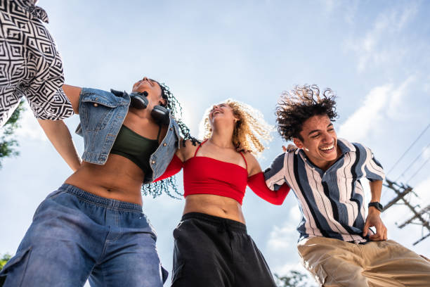 istock Young friends having fun outdoors 2133392772