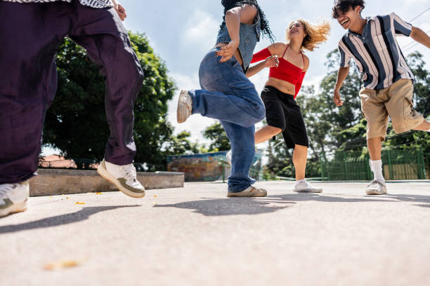 istock Young friends dancing outdoors 2133393290
