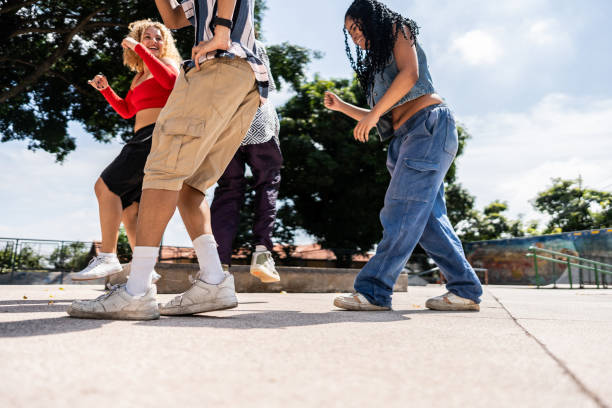 istock Young friends dancing outdoors 2133393595