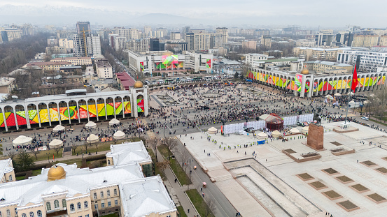 Bishkek, Kyrgyzstan - March 21, 2024: Aerial view of people celebrating Nowruz on central square of Bishkek city. Nowrus is a holiday of the arrival of spring and the New Year according to the astronomical solar calendar