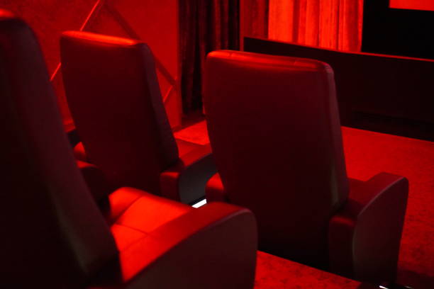 istock red cinema interior with leather chairs 2133423292