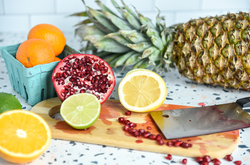 Close-up of freshly chopped tropical fruits on a kitchen counter