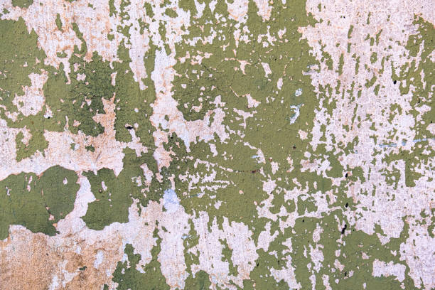 istock Worn out wall with peeling paint and faded colors. 2133434730