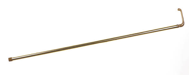 istock elegant golden walking cane isolated on white background 2133449290