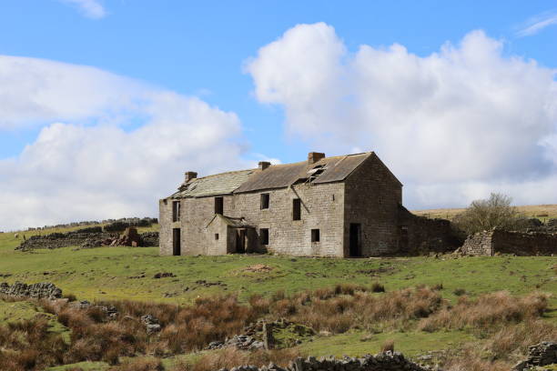 istock Abandoned farmhouse in remote countryside 2133459716