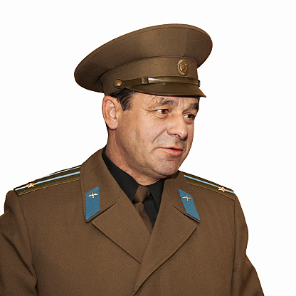 An isolated portrait on a white background of an officer lieutenant colonel of the Soviet Army, an emotion of importance and dignity.