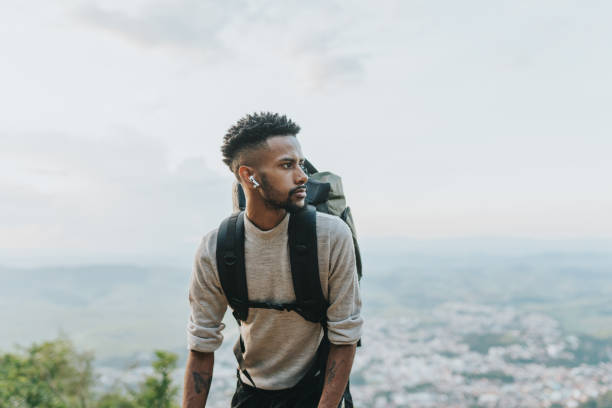 istock Backpacker arriving at the top of the mountain 2133480530