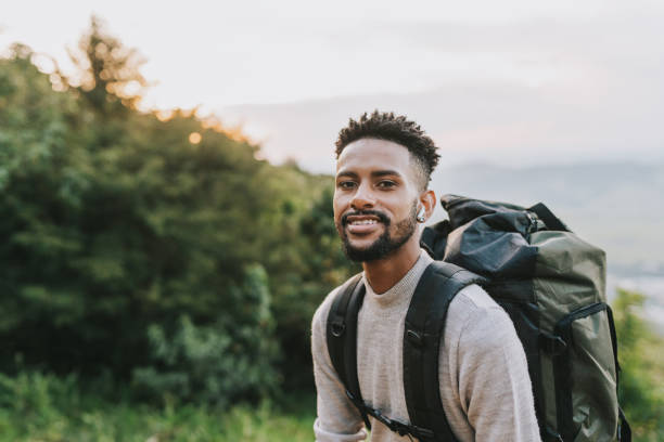 istock Backpacker enjoying adventure in natural park 2133481821