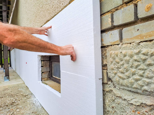 istock installing rigid styrofoam insulation board for energy saving of the house wall 2133483380