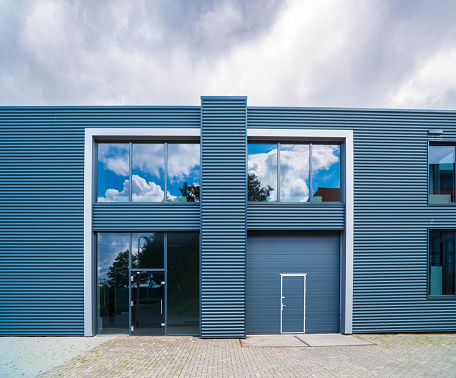 exterior of a modern warehouse with office unit