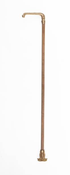 istock elegant golden walking cane isolated on white background 2133516771