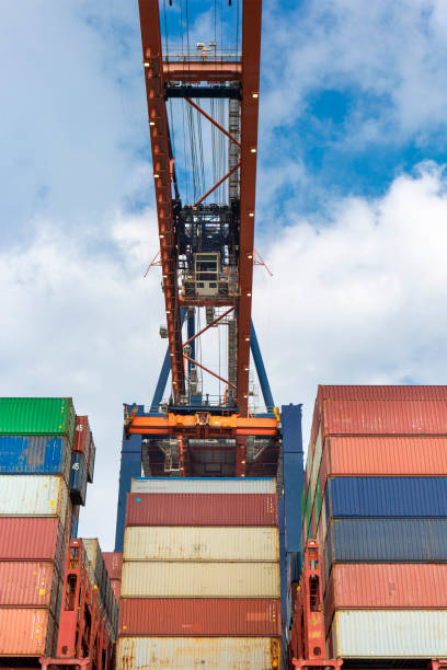 istock Large gantry crane loading a  container ship - port of Rotterdam - Maasvlakte 2133536378