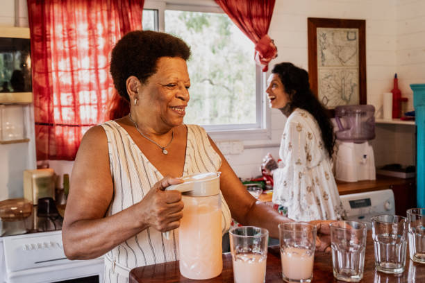 istock Senior woman preparing breakfast at home kitchen 2133556532