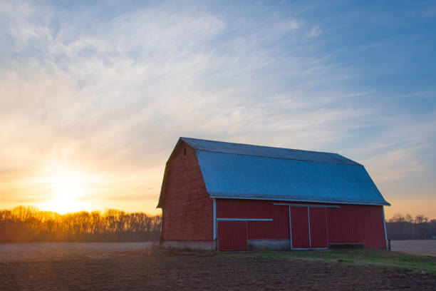 istock Red Barn at sunrise- Cass County, Indiana 2133568249