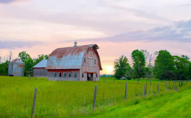 istock Old Weathered Red Barn at sunrise- Howard County, Indiana 2133568741