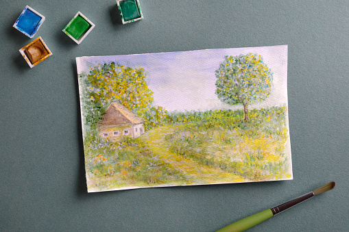 Photography of  a painted landscape with brush and watercolor paint.\nImportant notice:My own artwork.This is not a copy.Made exclusively for istock. Photographed  by me.