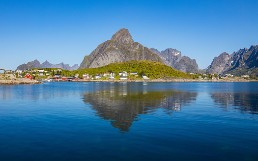 Perfect reflection of Reine village on the Lofoten Islands, Norway