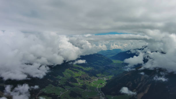 Aerial view of village in valley and mountain in Austrian Alps, Austria