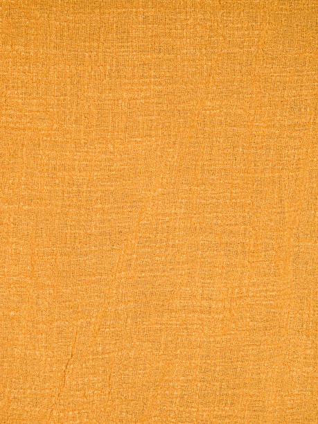 istock Beige burlap fabric as a background with a fold. 2133712996