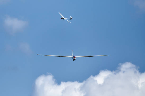 istock Glider in the sky begin landing 2133730523