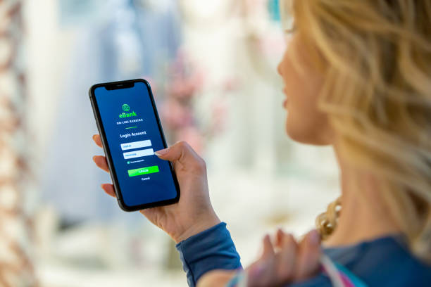 istock Streamlined Access: Woman Logs into E-Bank App 2133737503