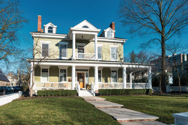 Large, traditional house in Ann Arbor, Michigan, USA on a sunny day.