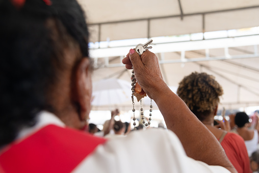 Salvador, Bahia, Brazil - December 29, 2023: Catholic faithful are seen during open mass at the Senhor do Bonfim church in the city of Salvador, Bahia.