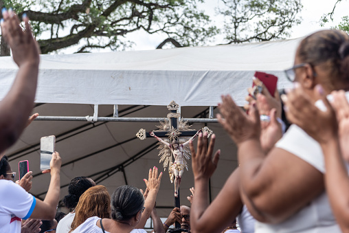 Salvador, Bahia, Brazil - December 29, 2023: Catholic faithful are seen during mass at the Senhor do Bonfim church, in the city of Salvador, Bahia.