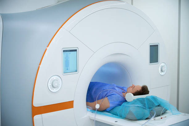 istock Patient undergoing magnetic resonance imaging of knee joint 2133870997