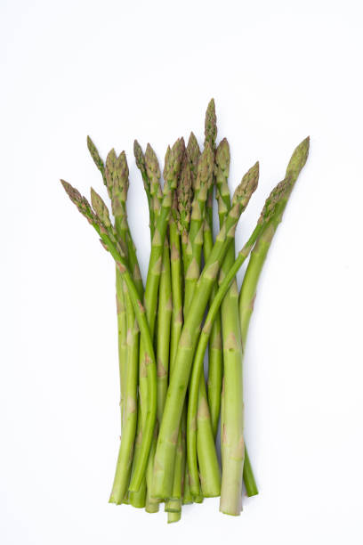 istock Fresh green asparagus on the white background 2133930594