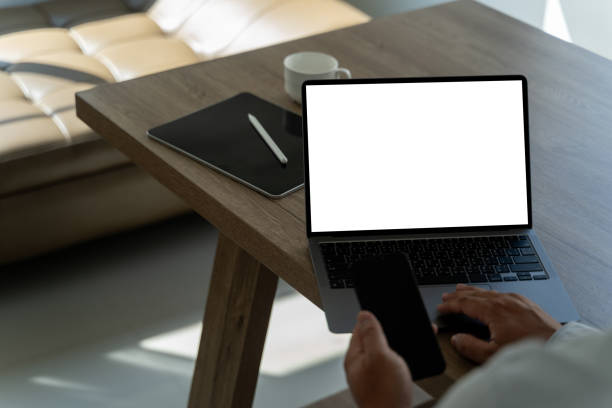 istock young man working Businessman using a desktop computer of the blank screen 2133975276