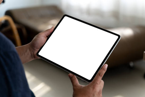 istock A businessman holds a mockup. digital tablet with blank screen Mockup Smart home control technology 2133975292