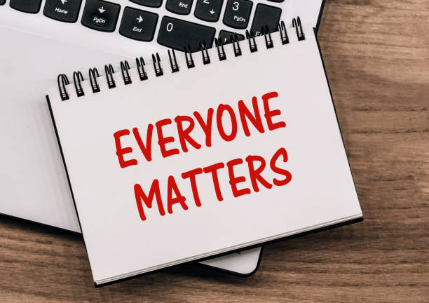 istock Everyone Matters text on the notebook on the office desk with laptop 2133993658