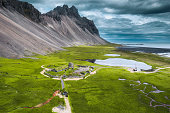 Abandoned icelandic viking village on wilderness near Vestrahorn mountain during summer at Stokksnes peninsula, Iceland