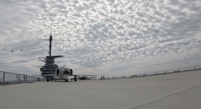 Flight deck of the USS Yorktown 2024 clouds above.
