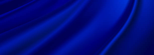 istock Navy blue silk satin fabric as background with wavy soft folds 2134142261