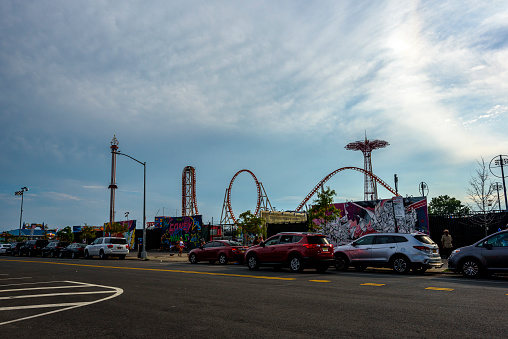 Brooklyn, NY, USA - August 18, 2018: New Yorkers and guests of the city visiting the historic Coney Island Luna Park on a warm sunny day.