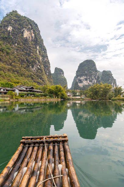 istock Beautiful Li river bamboo side Karst mountain landscape in Yangshuo, China 2134166442