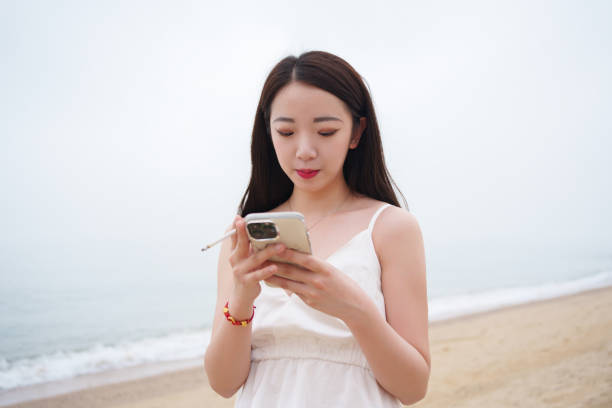 istock Young man looking at smartphone 2134195798