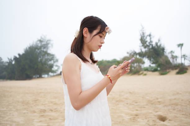 istock Young man looking at smartphone 2134197337