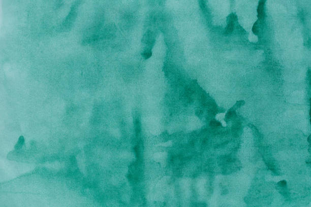 istock turquoise painted watercolor background texture 2134217553